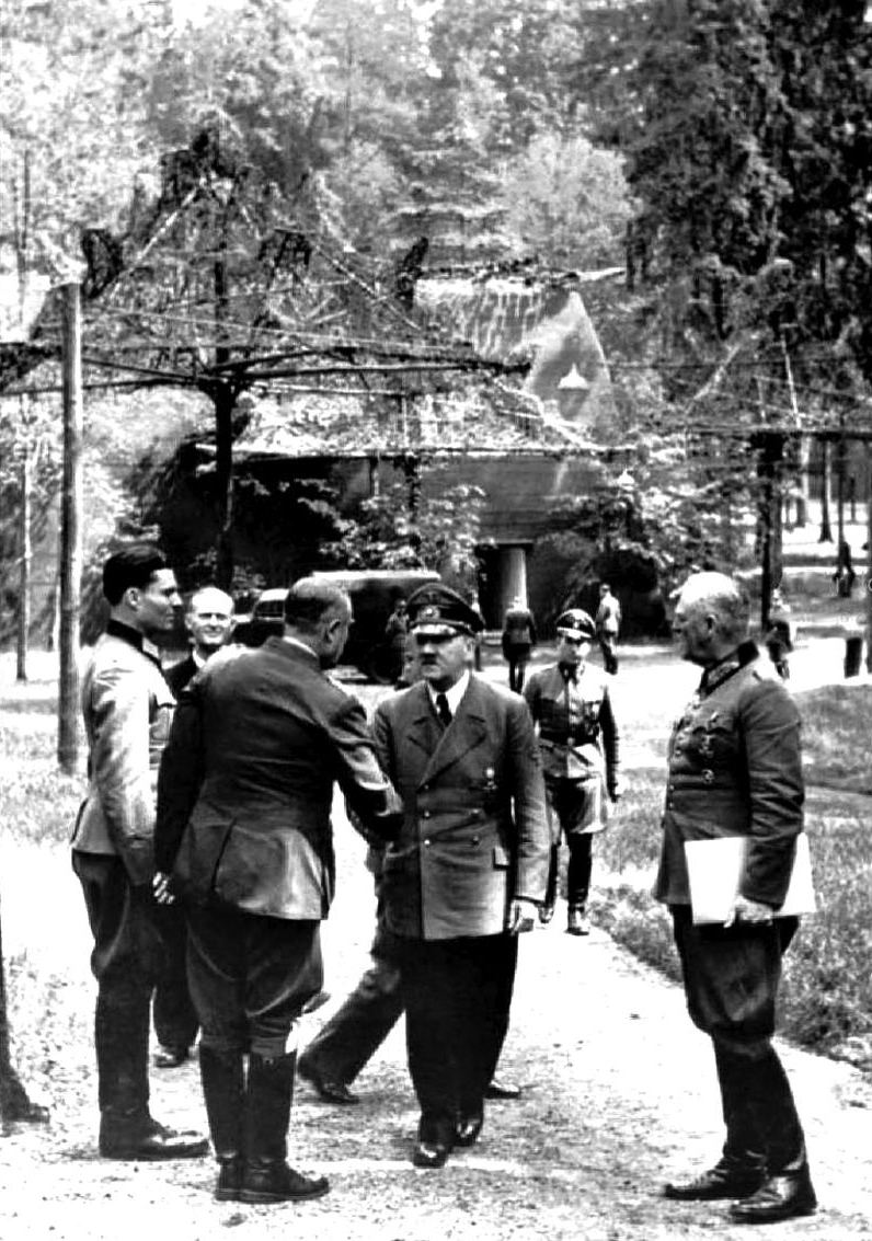 Adolf Hitler at the Wolfsschanze a few days before the 20th July bomb attack by Claus von Stauffenberg, who is pictured on the left